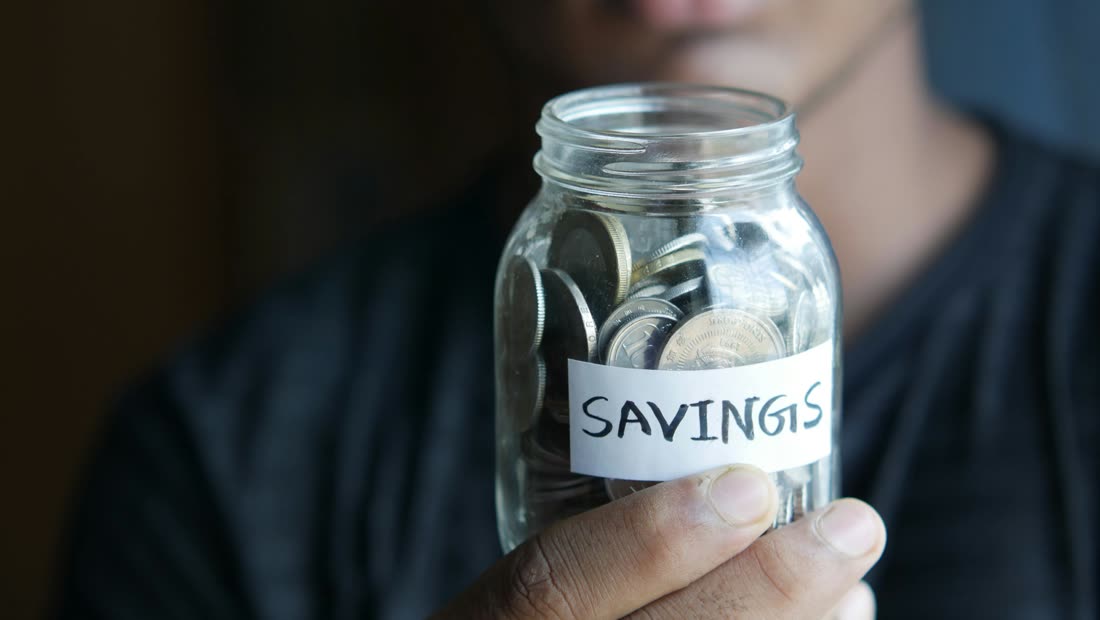 A piggy bank showing what cigarette money could become